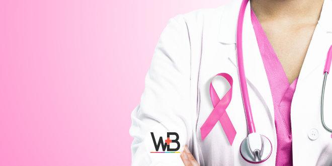médica com simbolo do outubro rosa no peito para conscientizar o câncer de mama